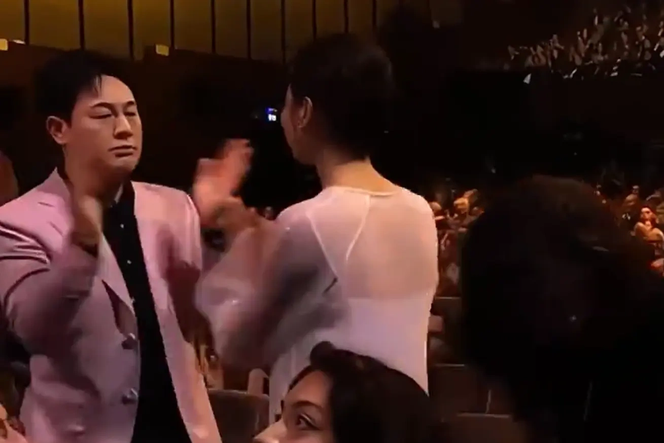 辛芷蕾封后喜事添波澜，张颂文表情引争议